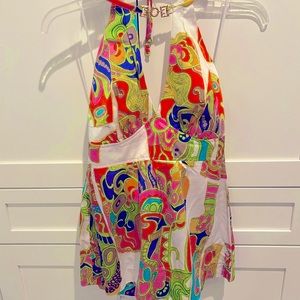 TRINA TURK halter with gold detailing. Ties at neck size 6